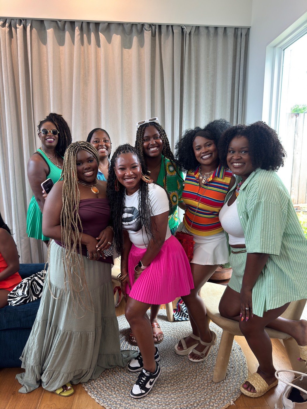 The whole group together, all smiles